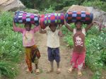 Helping to carry&nbsp;blankets